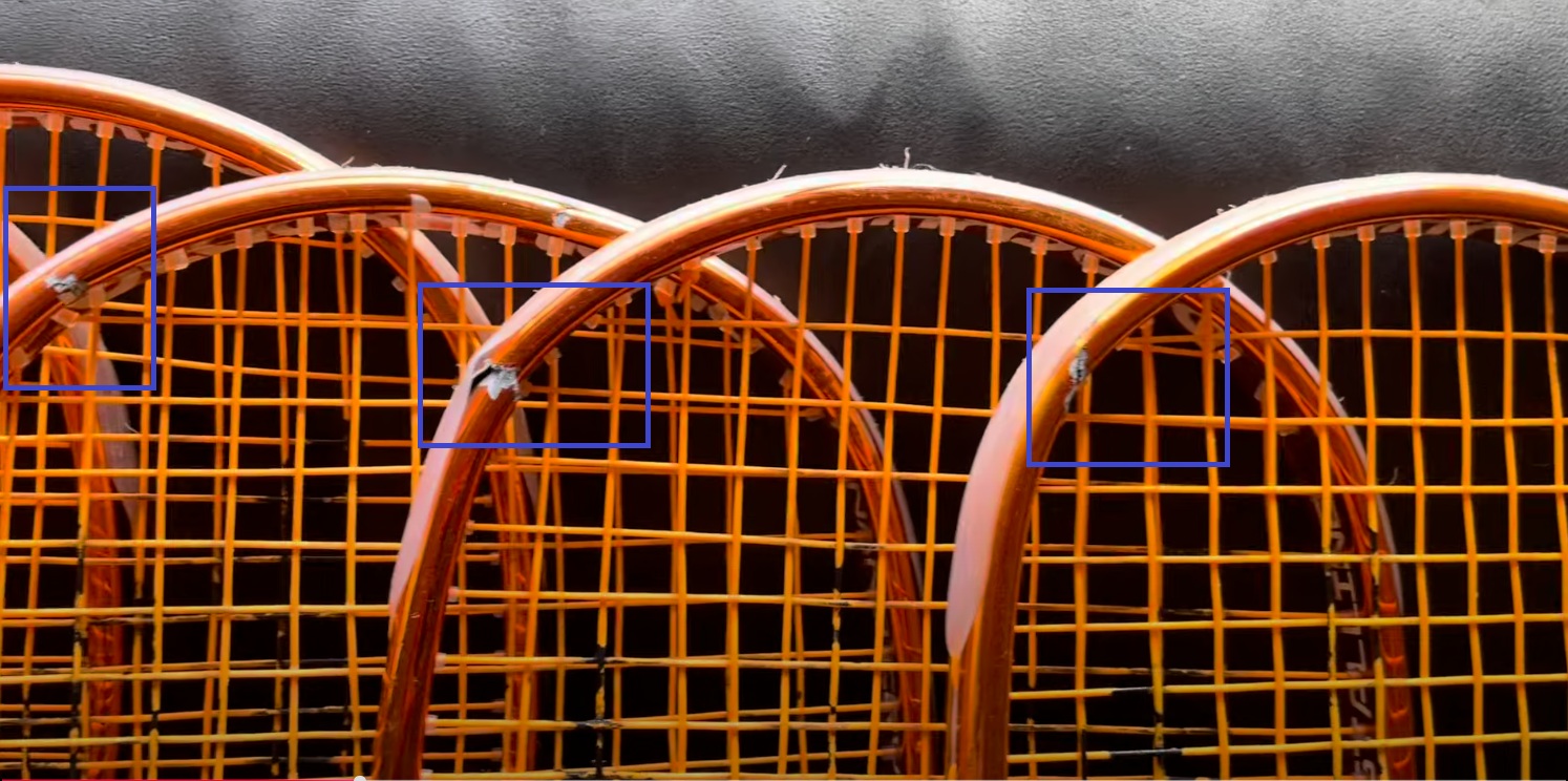 Black Knight Ion Storm broken frame with defect highlighted at top of racket head