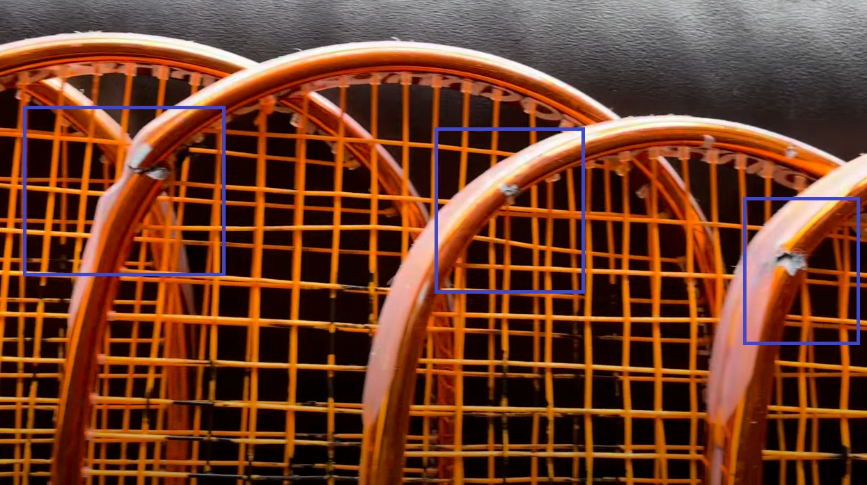 Three Black Knight Ion Storm rackets all showing identical crack at same location on frame head